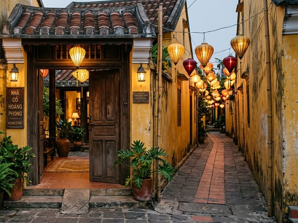 Lantern-lit alley in Hoi An at dusk
